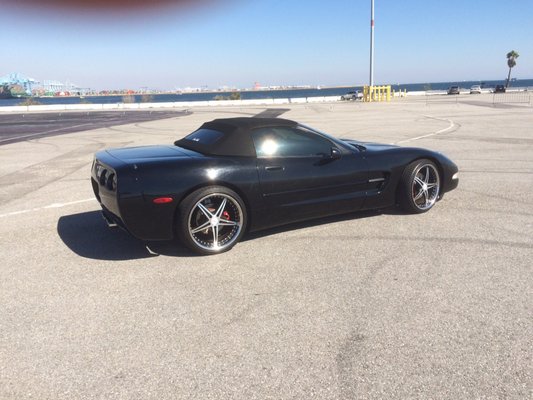 Black Corvette with a fitted convertible top