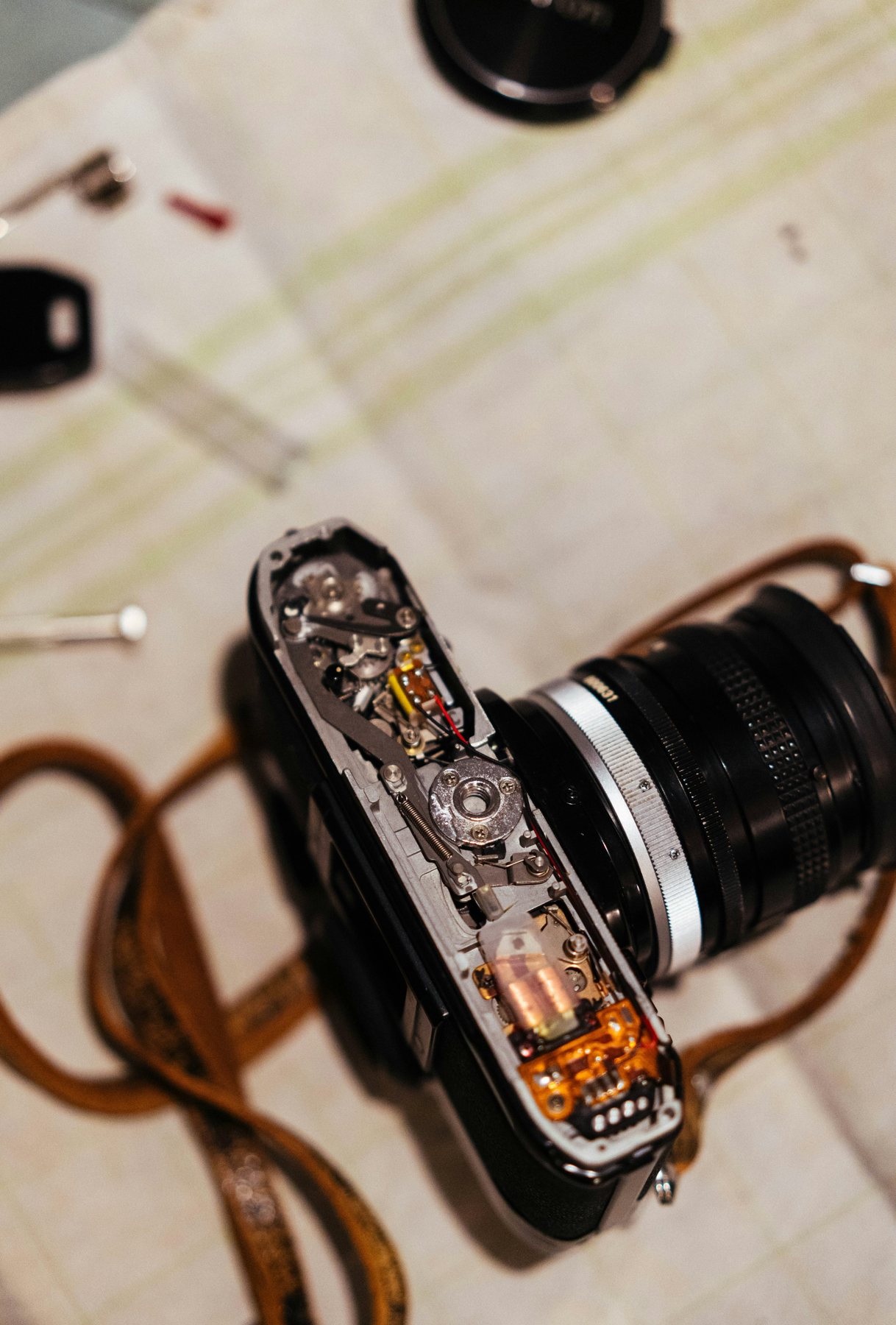 H T Camera Repair — real photographic design concept