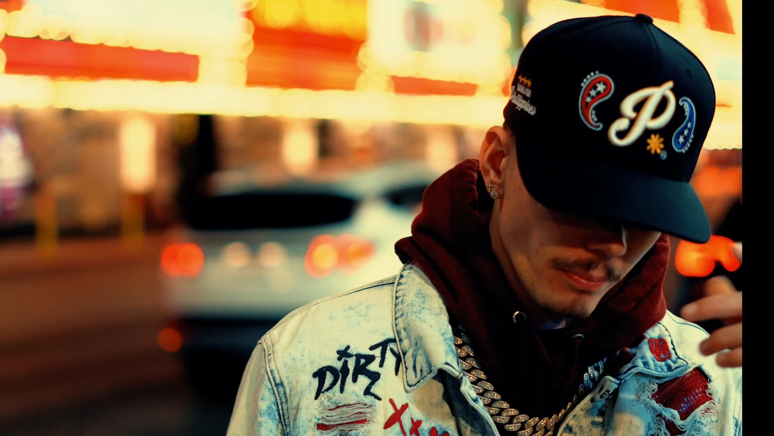 K3YLOW outside in a nighttime music video scene